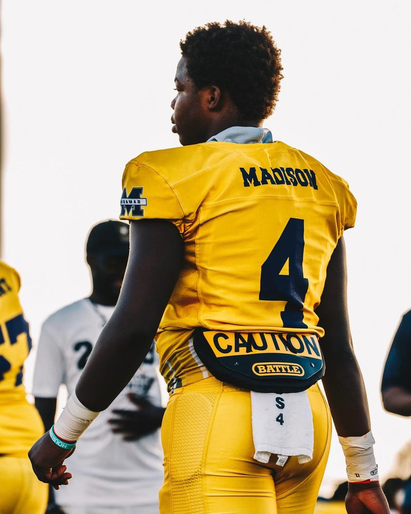 Caution Football Back Plate by Battle Sports